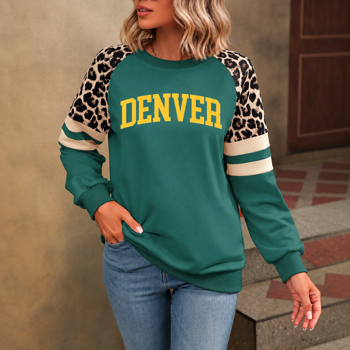 Denver God Is In DEN Leopard Sleeve Sweatshirt