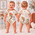 Front and back baby bodysuit with koi fish, orange flowers and Be Still and Know text