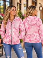 Front and back view of woman wearing pink Jesus Loves You floral zip hoodie